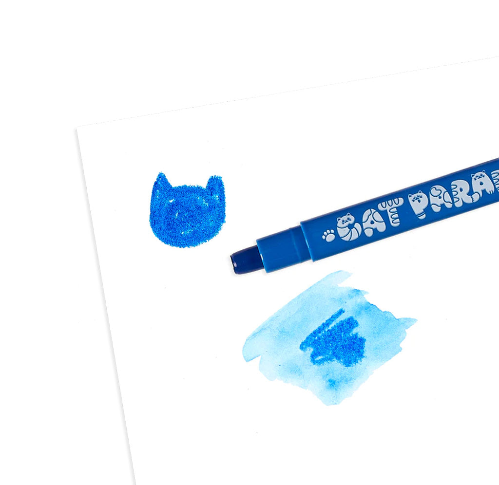 The blue crayon is open with a cat-shaped doodle and a scribble below it with watercolor effects. 