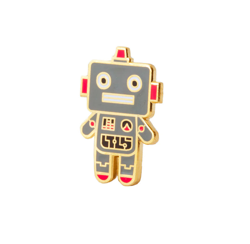 Angled view of the enameled robot pin. 
