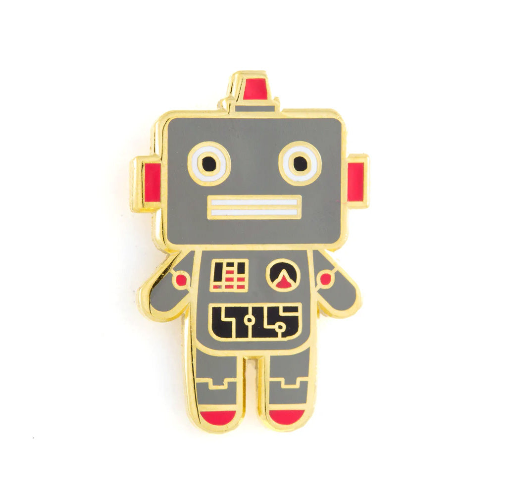 Gold enamel pin in the shape of a robot with a blocky head, gray body, and red details.