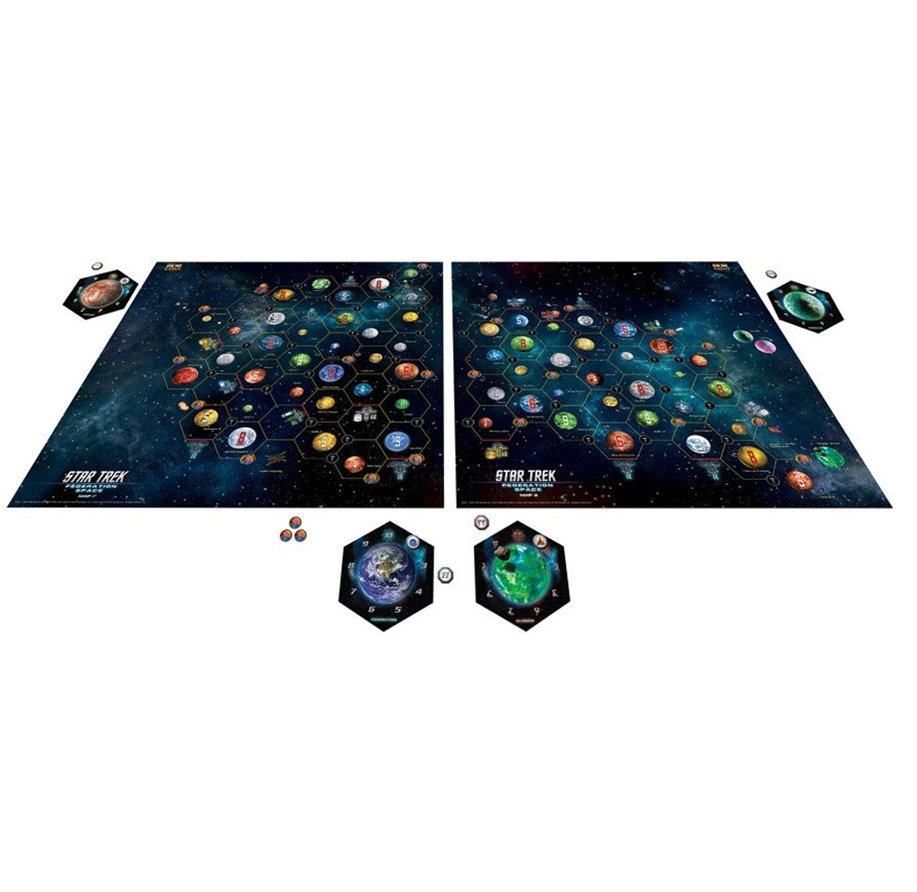 Game board pieces laid out, with two main boards side by side and four smaller hexagonal cards laid around the board. Small circle tokens are arranged near the hexagon pieces. 