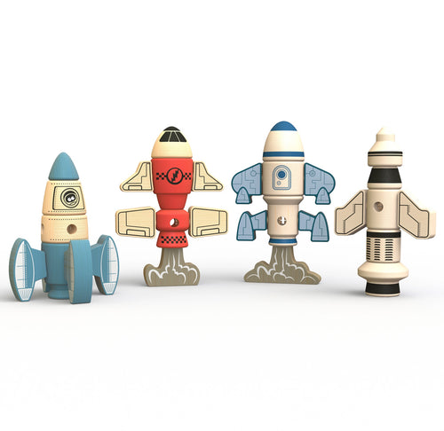 Four tinker totter rocket ships lined up on a white background