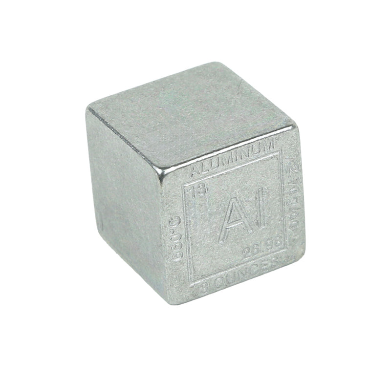 Silver cube with aluminum label on the front. 