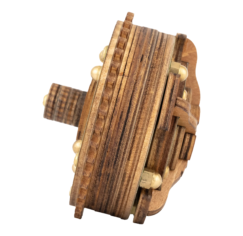 Close-up of an intricate handcrafted wooden mechanical object with layered grain, rounded edges, pegs, and carved components; warm, rustic tone.
