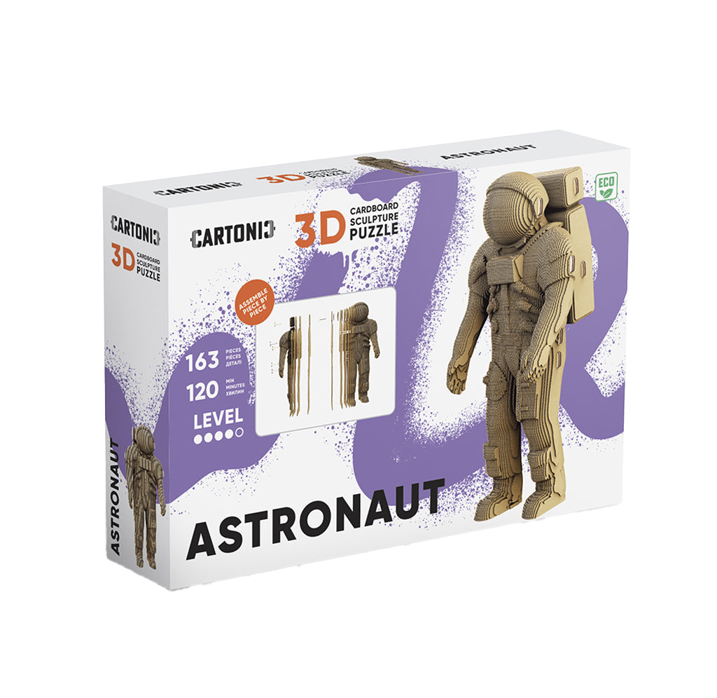 White box with purple streamers showing the carboard astronaut figure.