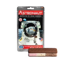 Astronaut Neapolitan ice cream sandwich package with a space-suited astronaut and freeze-dried chocolate, vanilla, and strawberry dessert.