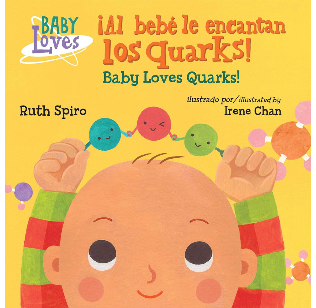 Front cover with yellow background and image of a baby holding three round quarks with smiling faces above its head. 