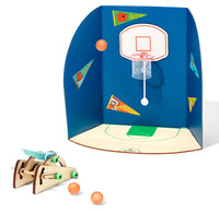 Children's basketball hoop set with toy basketballs and catapult on a white background