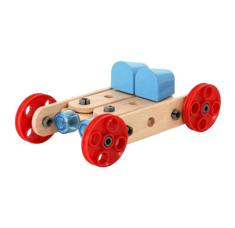 A wooden construction toy vehicle with four bright red wheels, blue blocks, and small connector pieces on a white background; playful, inviting tone.