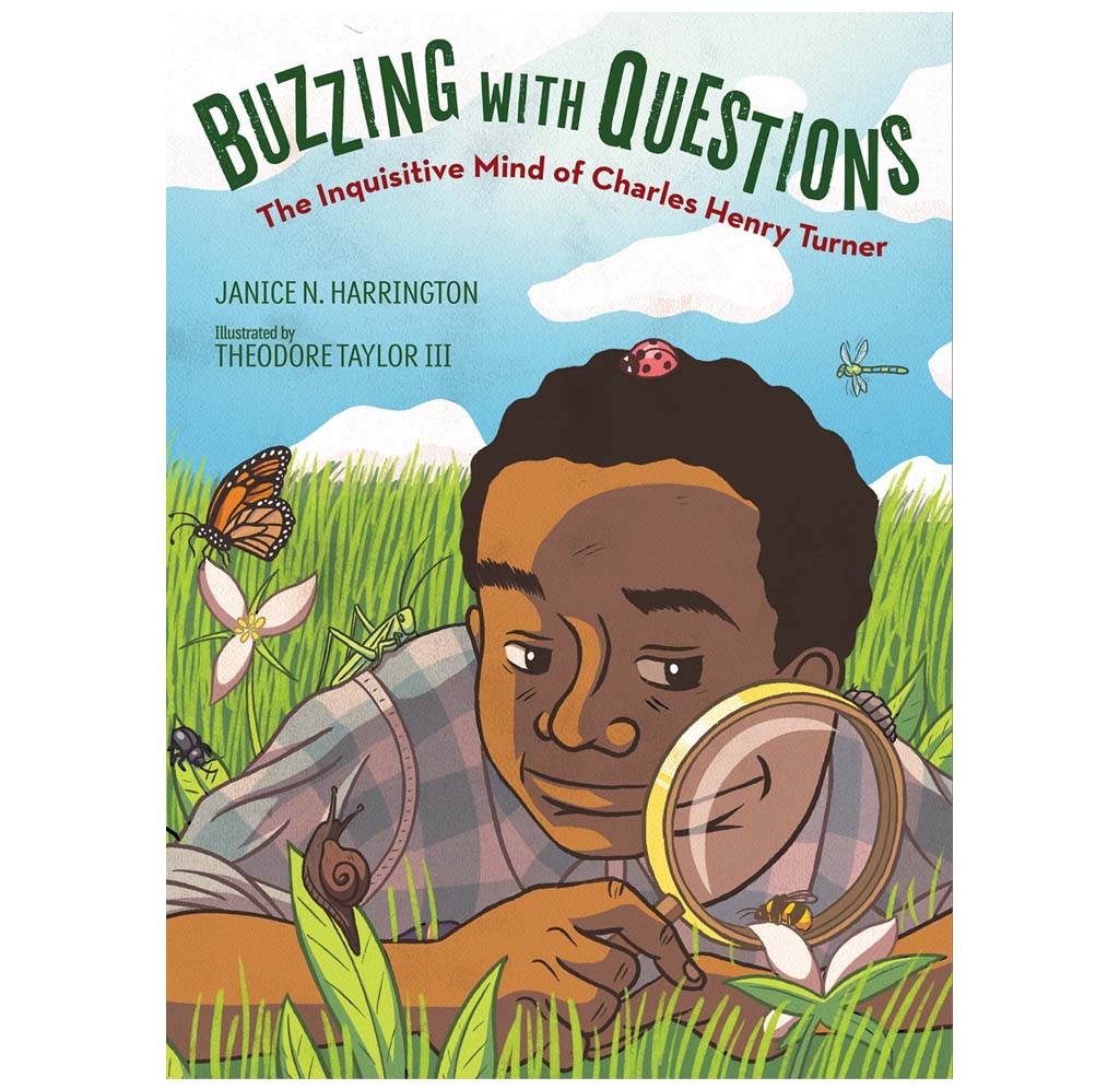 The hardcover book in question features an illustration of Charles Henry Turner as a young boy, standing amidst a grassy field with a magnifying glass held up to his eye. 