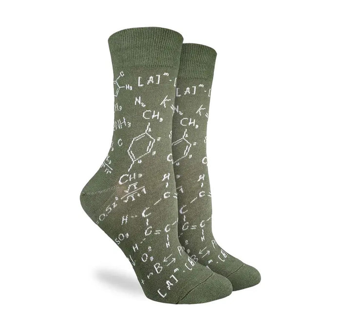 Green socks with chemistry formulas on a white background