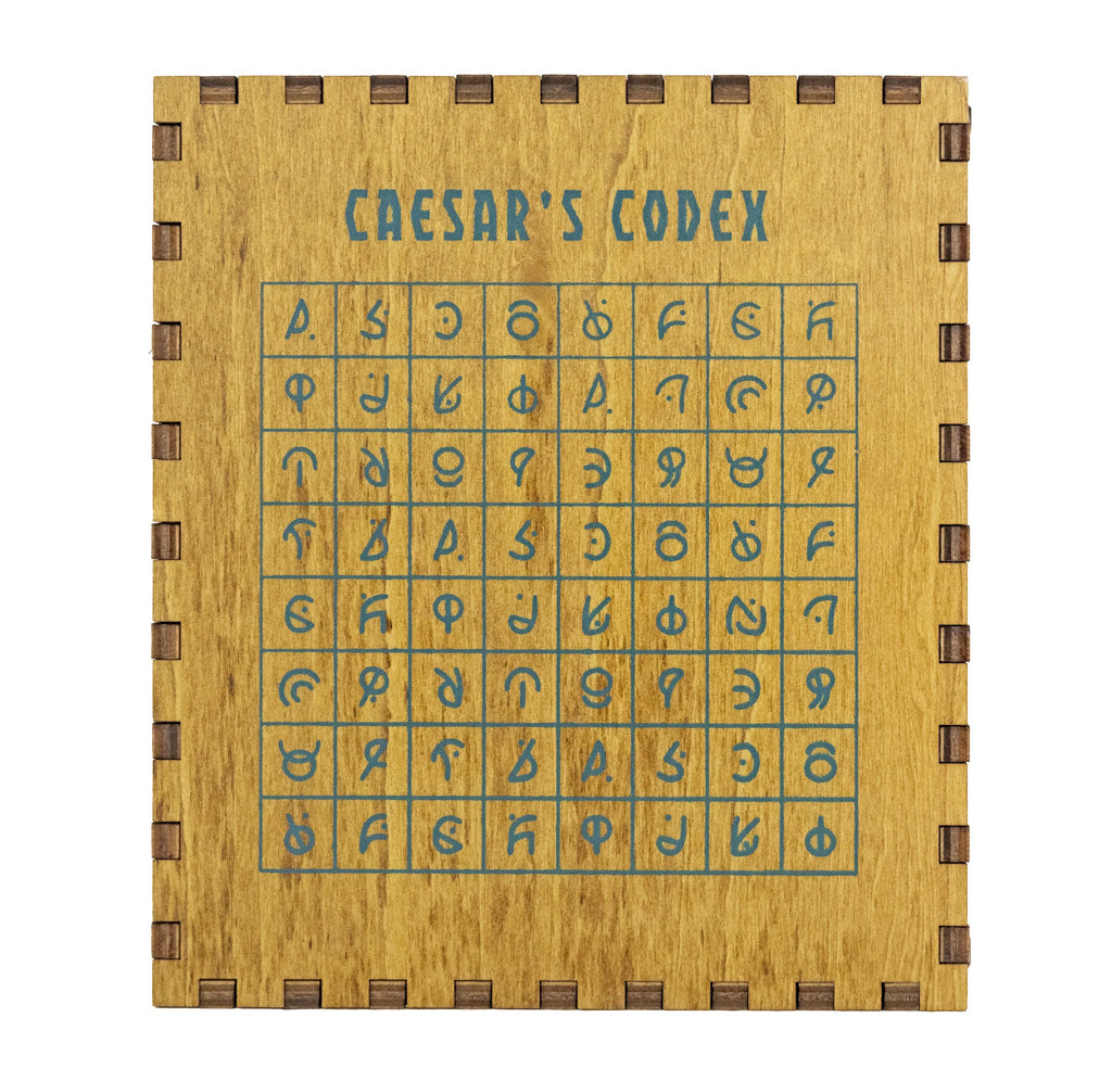 Wooden puzzle box with Caesar's Codex cipher grid on a white background