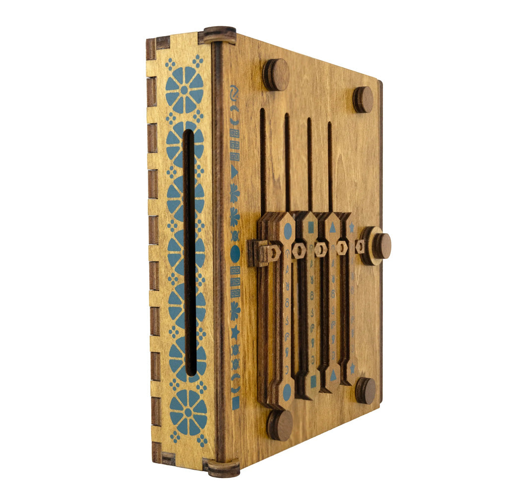 Wooden box with decorative patterns on a white background