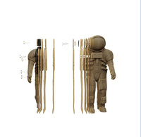 Brown woven figure with various parts on a white background