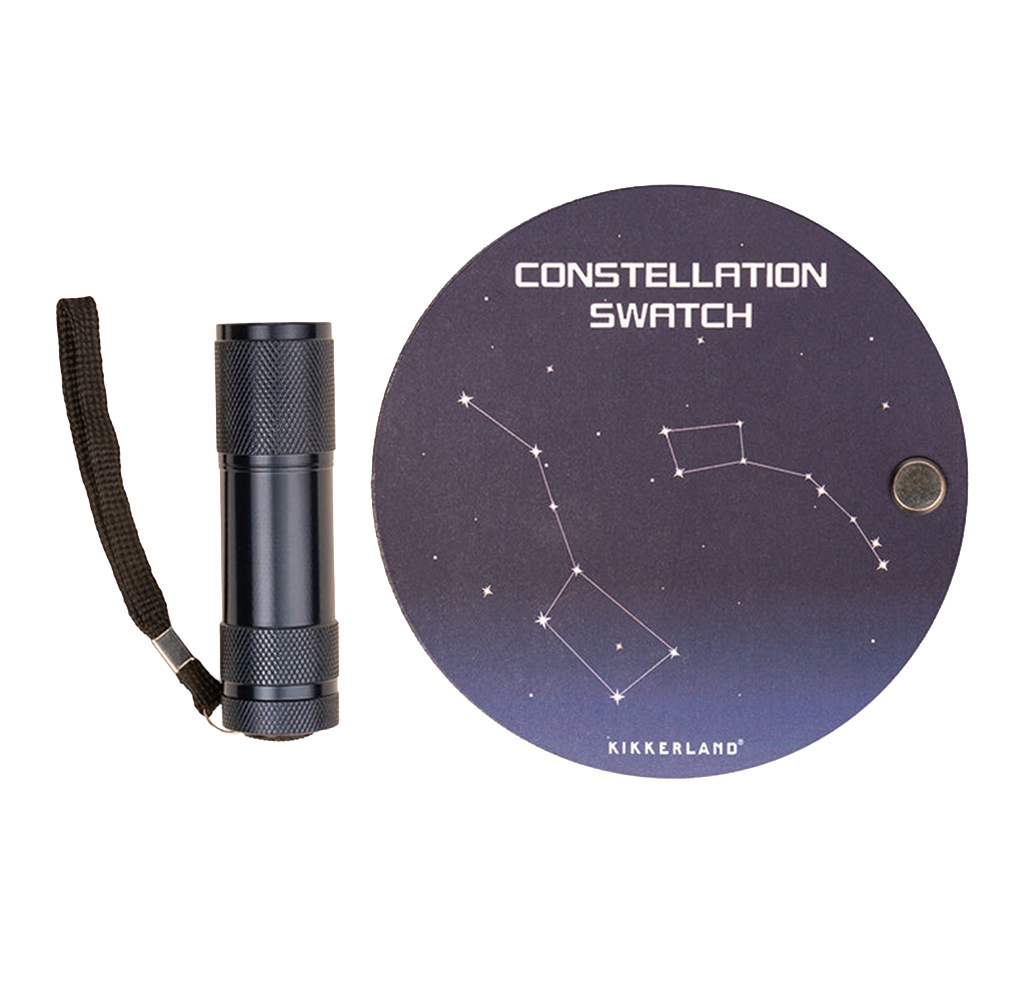 Kikkerland Constellation Swatch with UV flashlight, featuring a black handheld light with wrist strap and a round constellation guide card for viewing star patterns.
