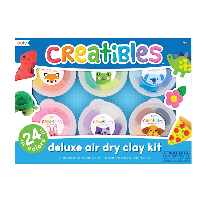 Colorful Creatibles deluxe air-dry clay kit box showing six clay tubs with animal faces and playful clay figures; bright, cheerful design for ages 6+.