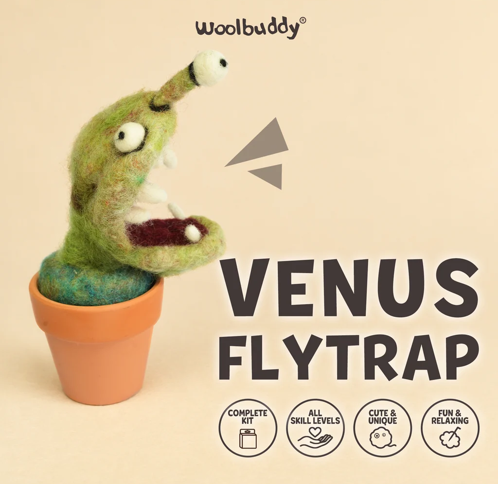 A playful green felted Venus flytrap craft from Woolbuddy sits in an orange pot beside bold product lettering and kit icons, on a warm cream background.