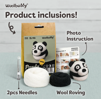 Woolbuddy “Product inclusions” display shows a panda needle-felting kit, photo instruction sheet, two needles, and white and black wool roving on a tabletop.
