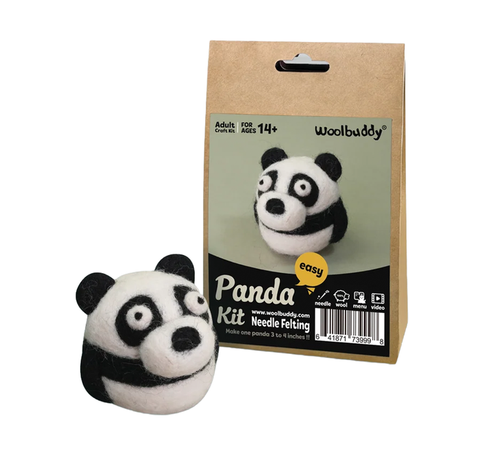 A woolbuddy needle-felting kit package shows a smiling felt panda, with a finished panda figure beside it on a white background; playful, inviting craft scene.