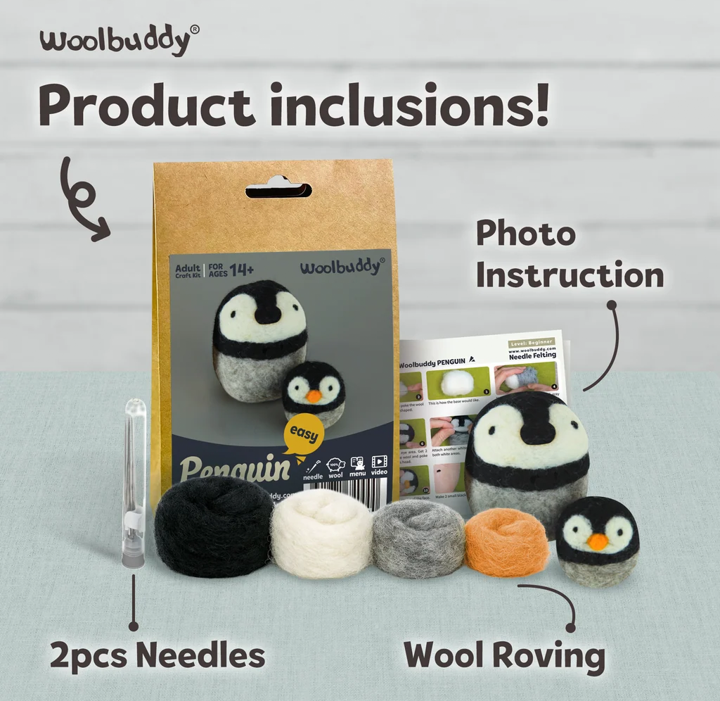 WoolBuddy penguin needle-felting kit display shows a boxed penguin, photo instructions, two needles, and four wool roving colors; cheerful product layout.