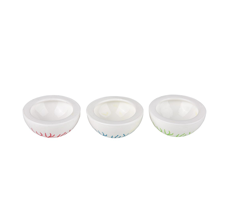 Three small white eyeball popper toy with colorful vein patterns at the base, arranged in a row on a plain white background.
