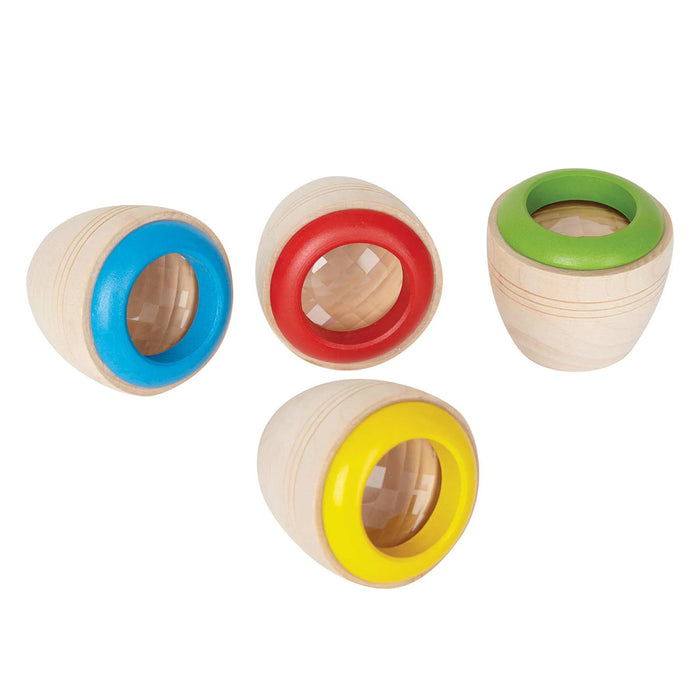 Set of wooden objects with colorful inner rings on a white background