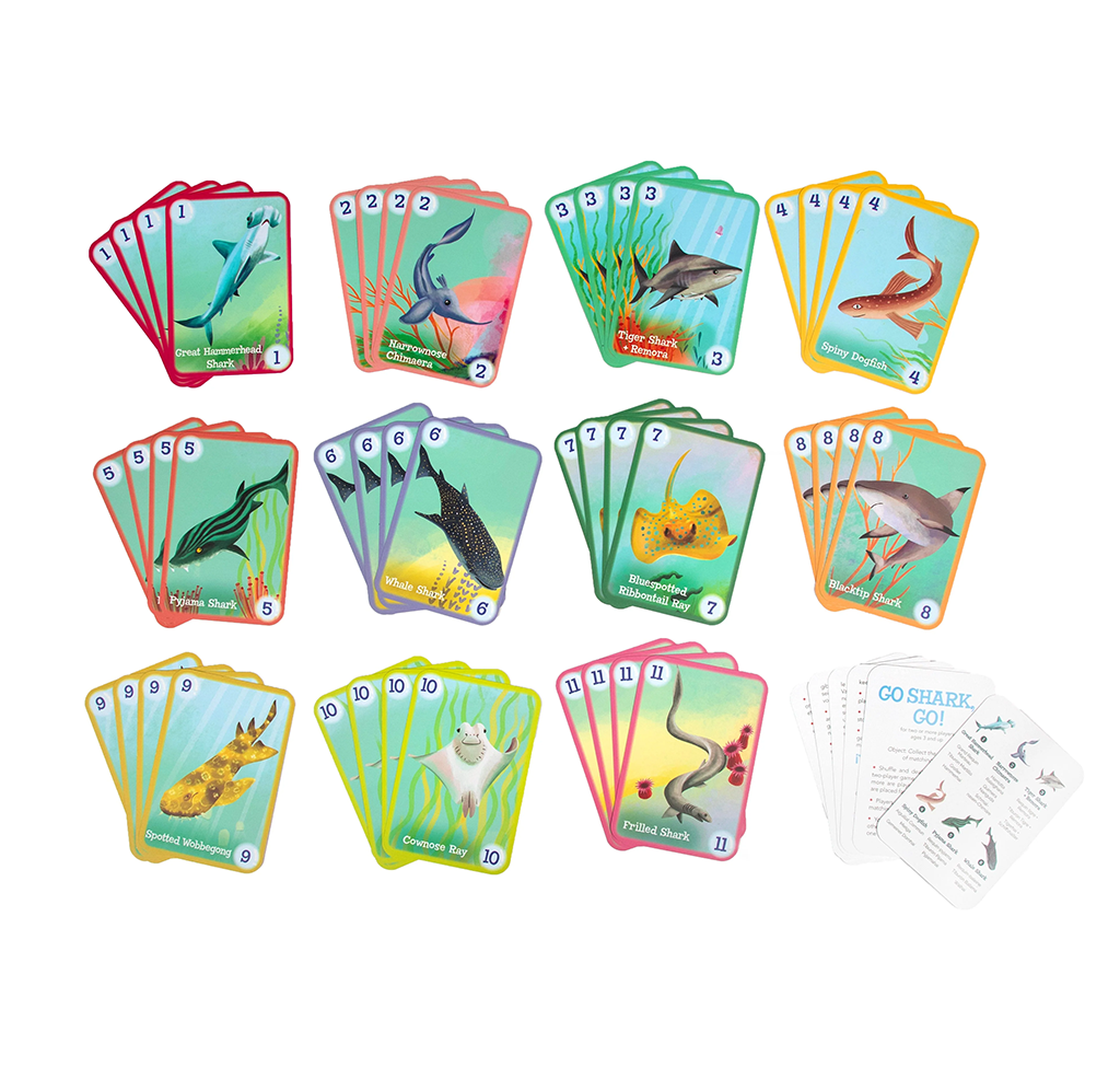 Colorful ocean-animal card game displayed on white: numbered card sets show sharks, rays, turtles, and other sea life, with instruction cards at right; playful, educational tone.