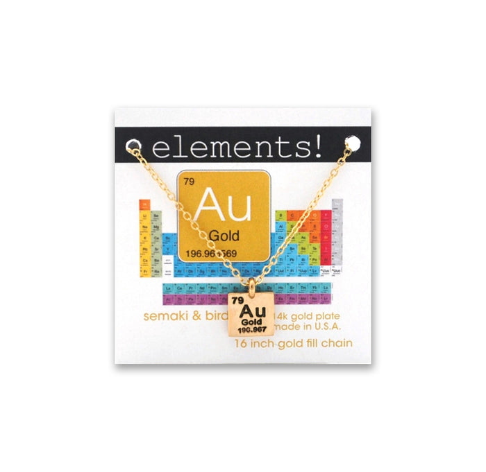 Gold necklace with 'Au' pendant on a 'elements!' branded card