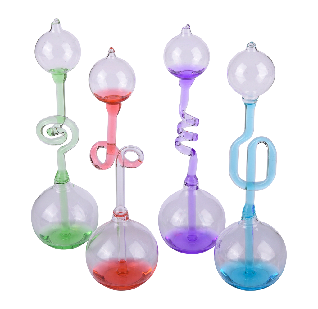 Four colorful glass hand boilers stand against a white background, with clear bulb-shaped chambers and twisted green, red, purple, and blue stems; playful, whimsical tone.