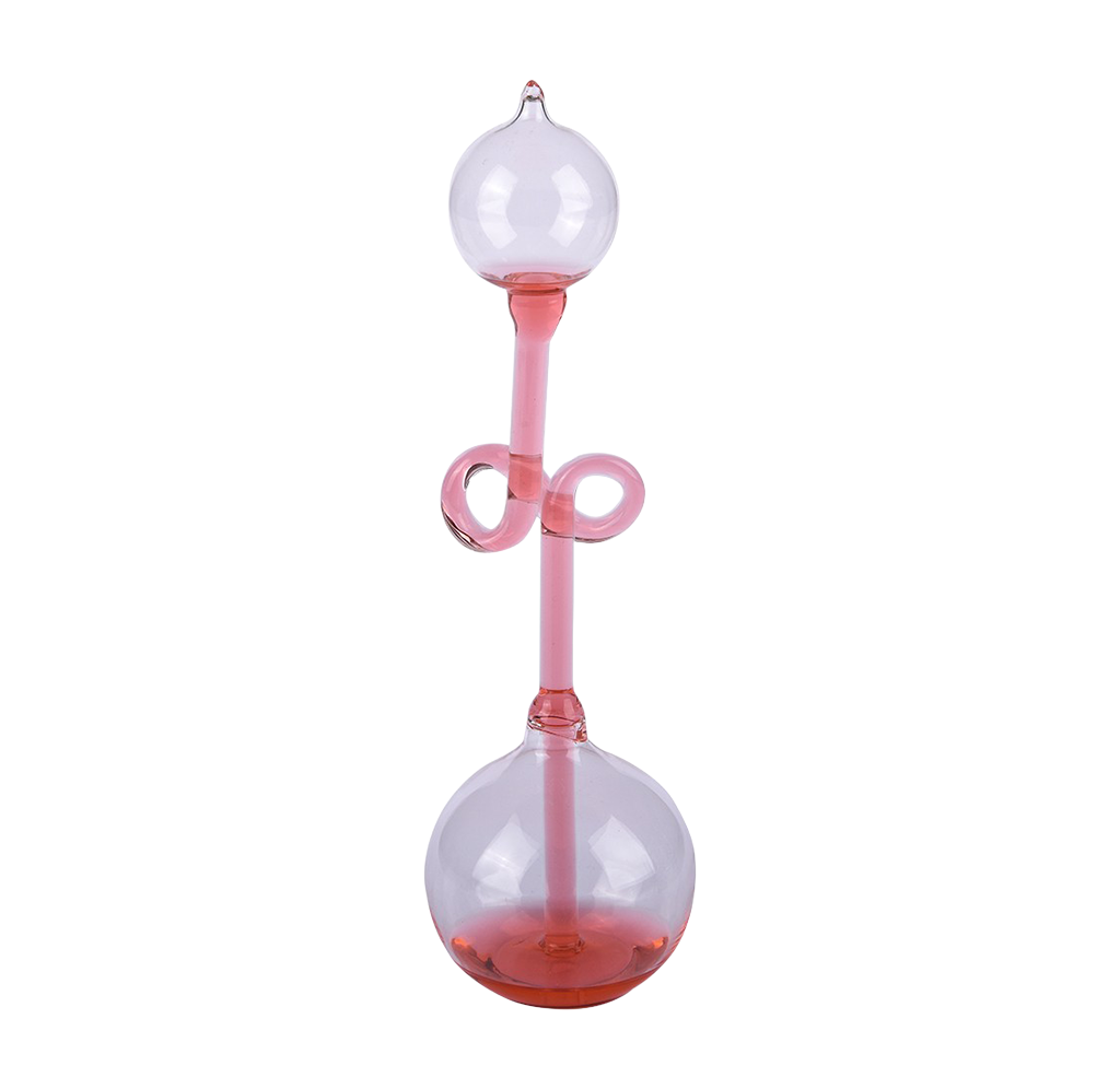 A delicate glass hand boiler with two clear spherical chambers, a slender stem, and looped handles, isolated against white; elegant, vintage feel.
