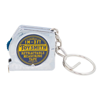 A compact silver Toysmith retractable measuring tape labeled “1 m–3 ft,” attached to a metal key ring; a practical, portable tool on a white background.