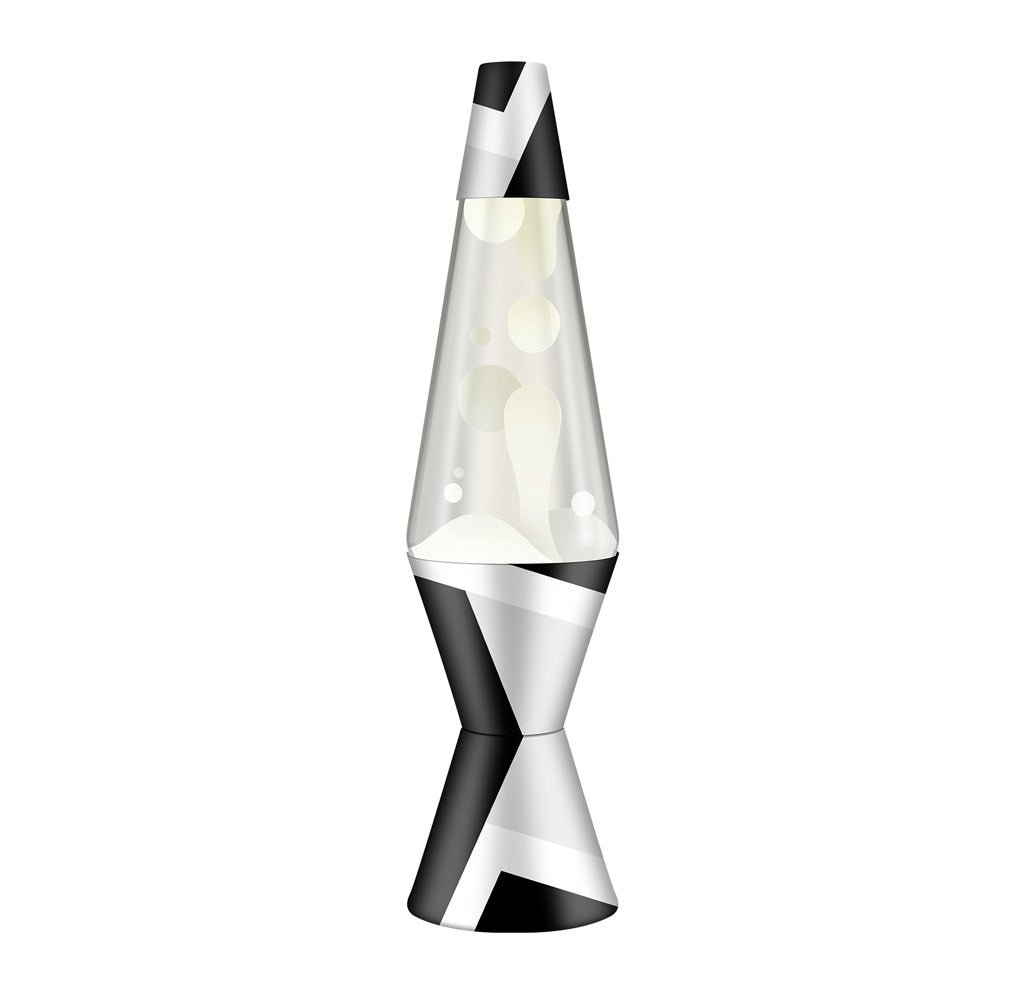 A lava lamp with white liquid and white and black geometric pattern at the base. 