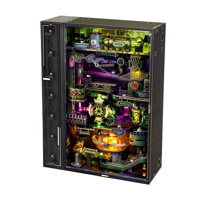 A black, glass-fronted marble run displays a dense steampunk workshop of gears, pipes, gauges, and glowing green, purple, and orange lights. Its intricate design feels playful and fantastical.