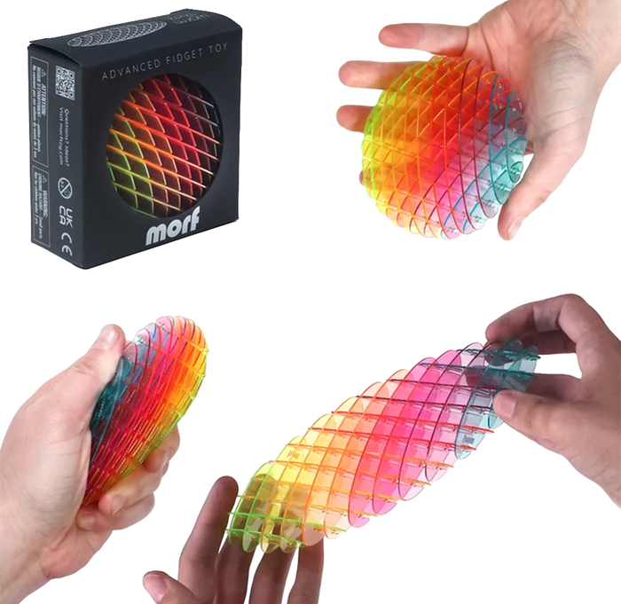 A multicolor advanced fidget toy shown with its black retail box and demonstrated by hands in three views on a white background. The toy is made of translucent grid-like plastic with rainbow color transitions.