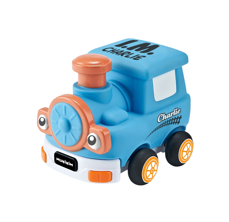 A cheerful blue toy train with an orange smokestack, front wheel, and wheel hubs sits against a white background; “Charlie” is printed on its roof and side.