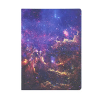 Notebook with a colorful galaxy design on a white background
