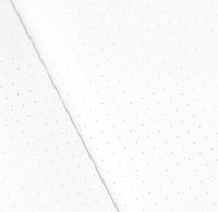 Two white sheets of paper with subtle dot patterns on a white background