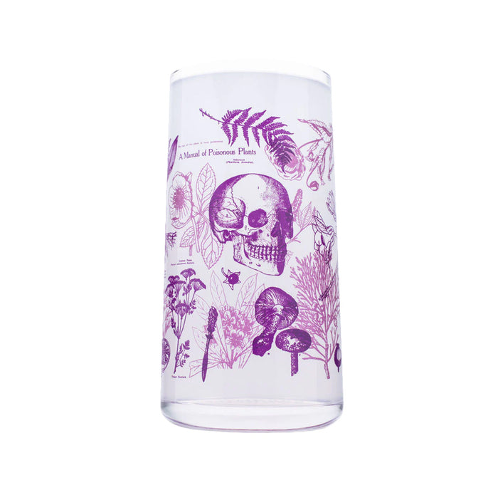 Cylindrical glass container with purple botanical and skull design on a white background