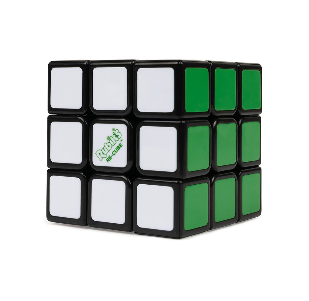 A 3x3 cube with different colored squares of green and white.