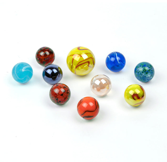 Assorted colorful marbles on a white background