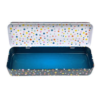 An open metal pencil case with a white lid decorated with a colorful star pattern, and a dark gray base with a matching star pattern on the outside. The interior of the case is a solid blue.