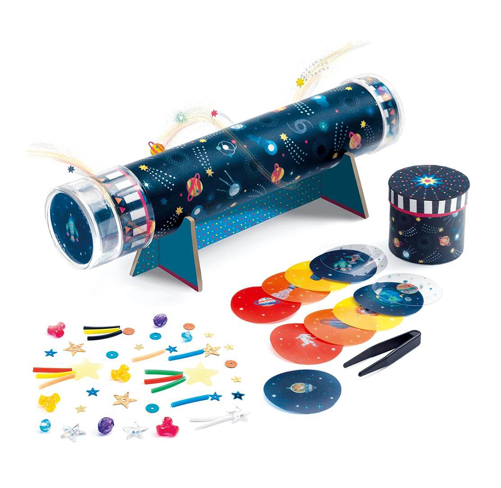 A colorful children’s astronomy toy set features a star-patterned telescope on a stand, a matching storage tin, planet discs, and space-themed stickers, creating a playful, curious mood.