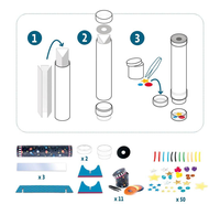 Illustrated step-by-step kit for assembling a clear kaleidoscope tube, with instructions for adding colored beads and decorative parts; playful craft activity.