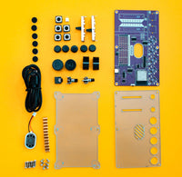 Collection of electronic components and boards on a yellow background