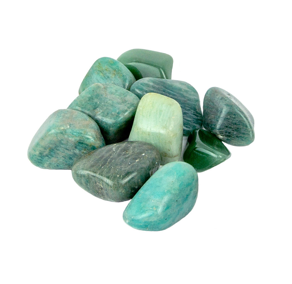 Collection of blue-green stones on a white background