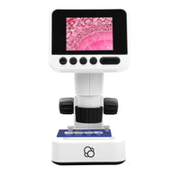 A white microscope facing forward showing a pink image of a cell on its digital screen. 