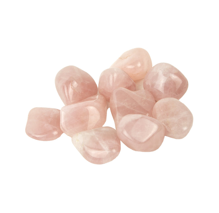 Pink tumbled stones on a white background