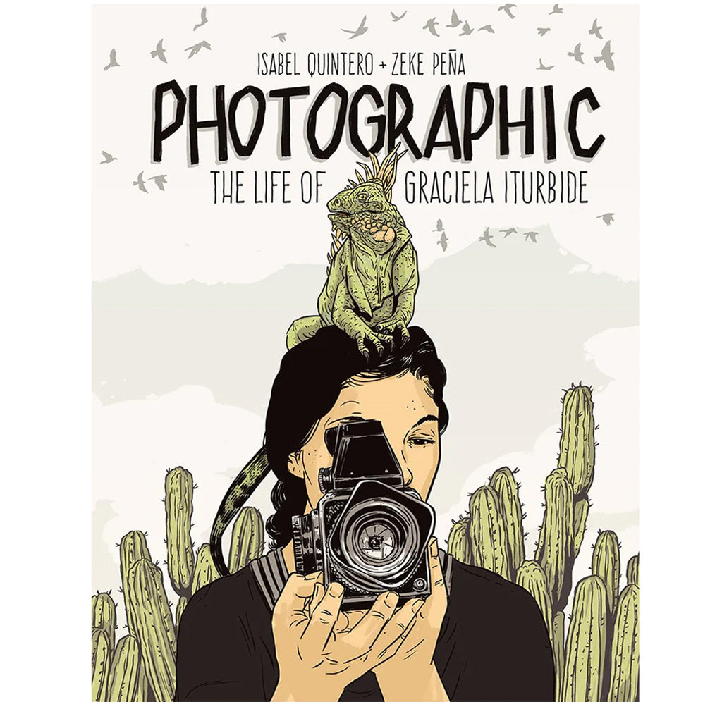 A graphic novel-style image of Graciela Iturbide taking a photograph with a green iguana on her head and a giant green cactus behind her.