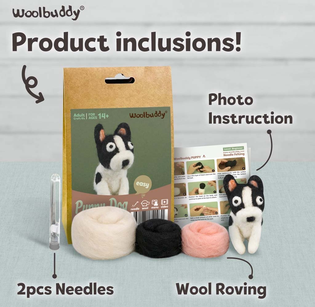 Woolbuddy Puppy Dog photo instruction kit product display showing a kraft paper bag, a small black-and-white puppy figure, three wool roving balls in cream, black, and pink, plus two needles, with text labels pointing to photo instruction and 2 pieces needles.