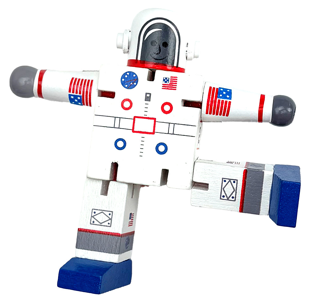 Toy wooden robot with USA astronaut design on a white background