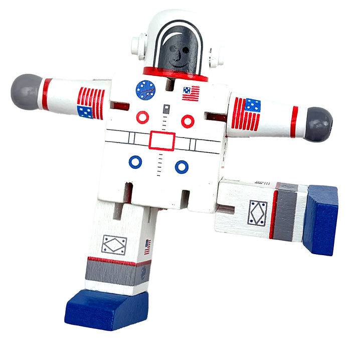 Toy wooden robot with USA astronaut design on a white background